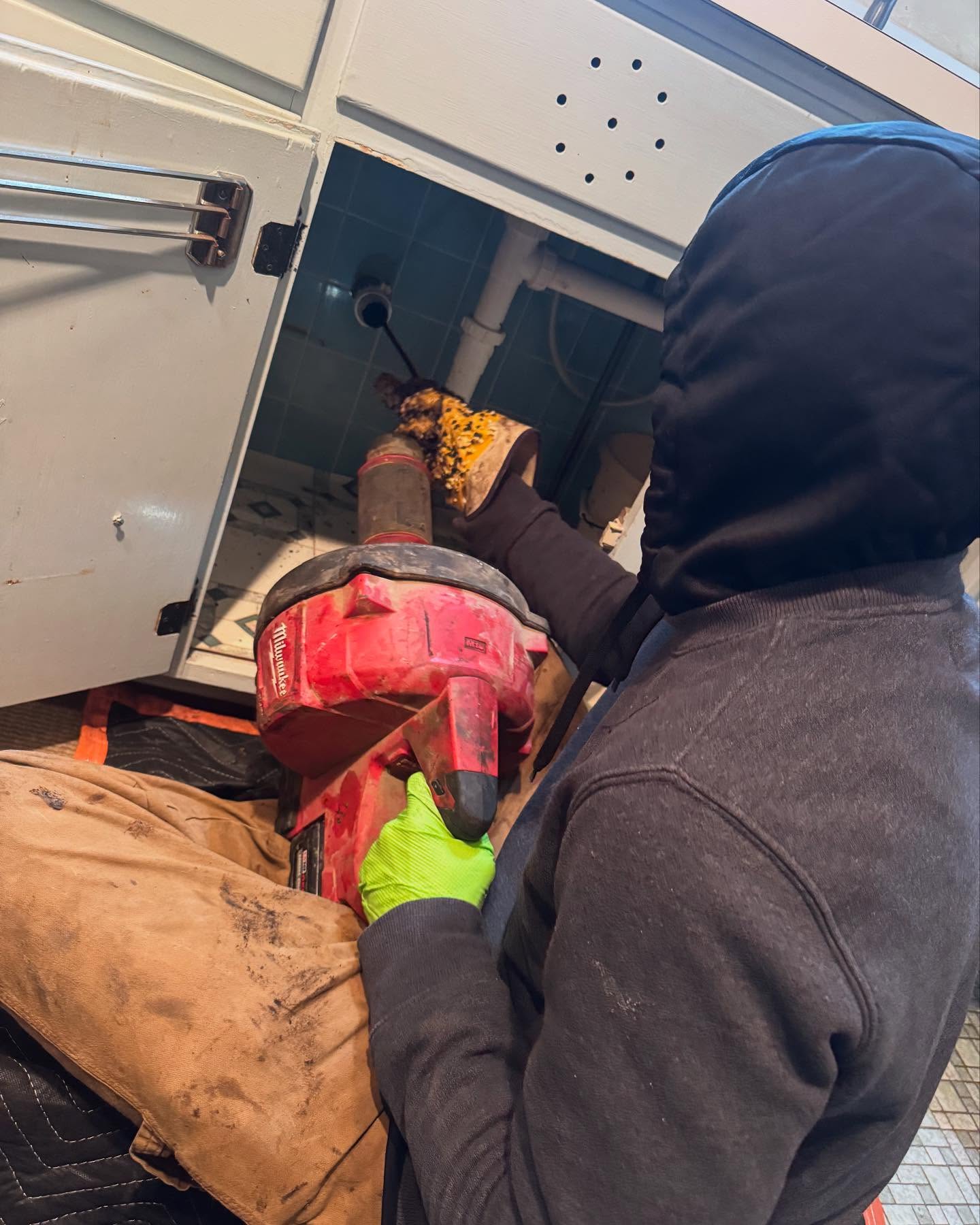 Top Notch drain cleaning with Milwaukee snake