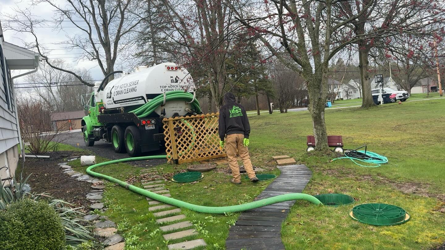 Top Notch septic tank pump-out in progress